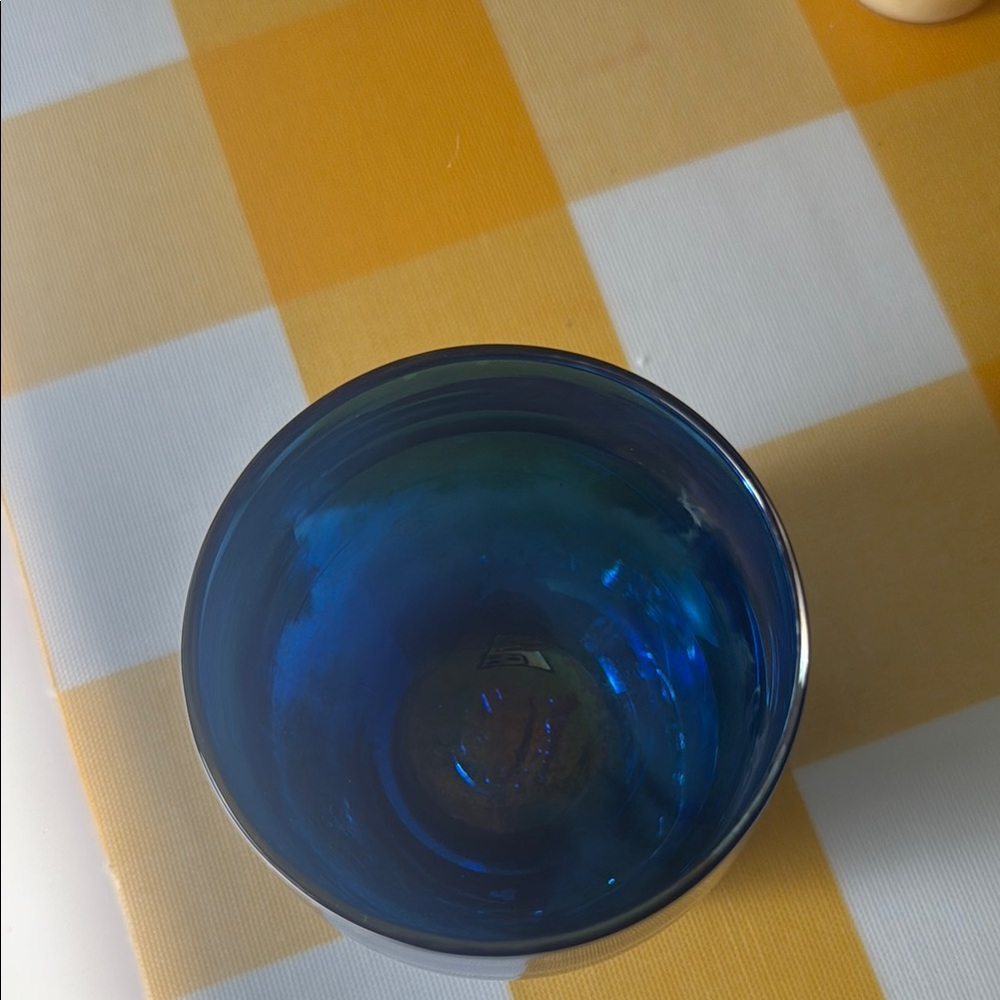 Vibrant Blue Candle Holder with Striking Accents